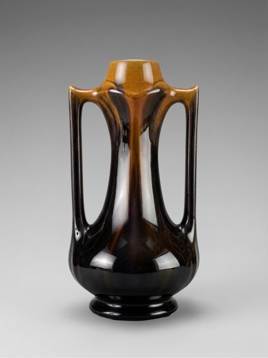 Art Deco vase in flamed black-brown enameled stoneware – openwork handles – French work – 1930s – 28 cm
