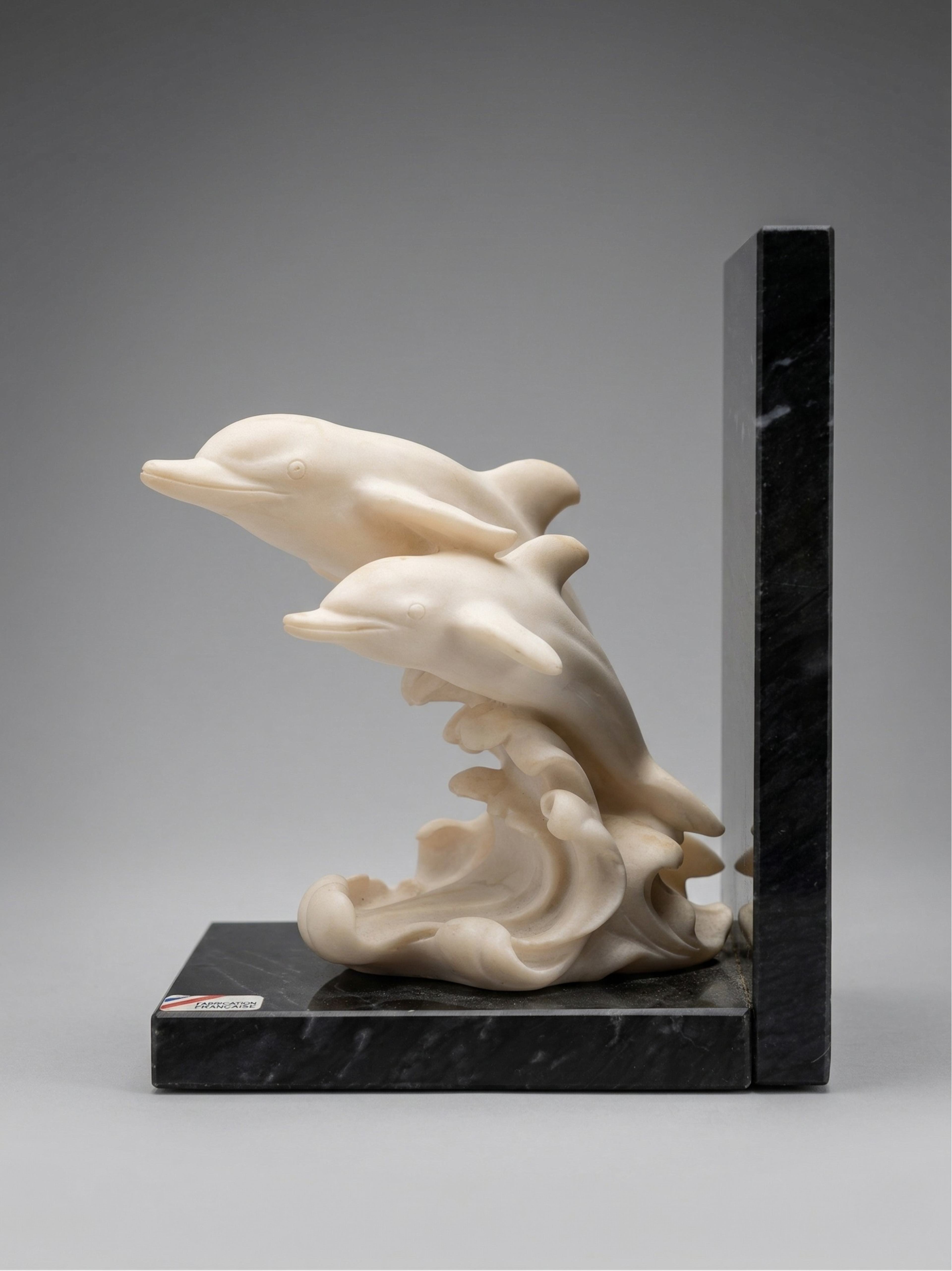 Pair of dolphin bookends – Ivory-effect resin & marble base – Art Deco style