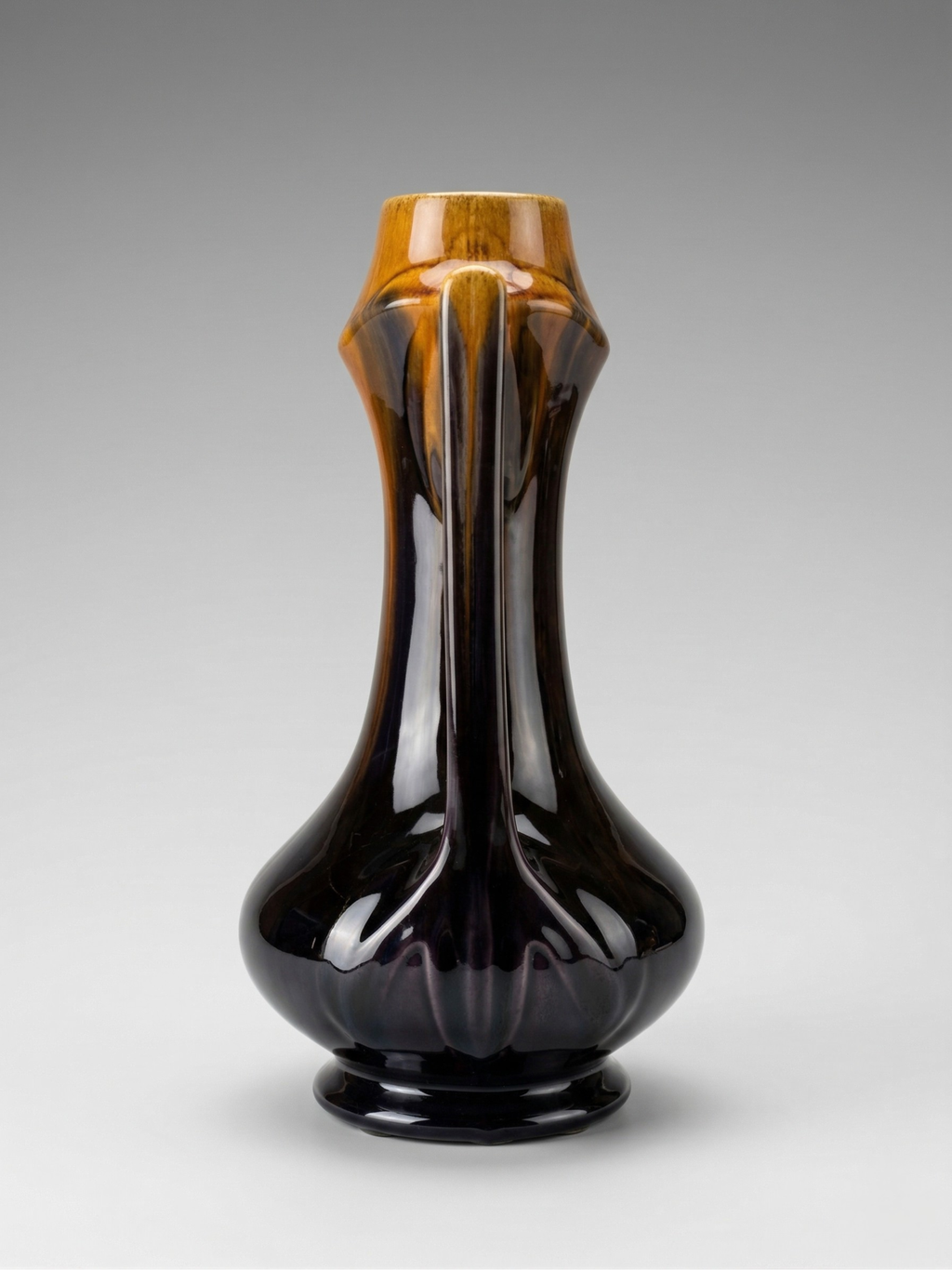 Art Deco vase in flamed black-brown enameled stoneware – openwork handles – French work – 1930s – 28 cm