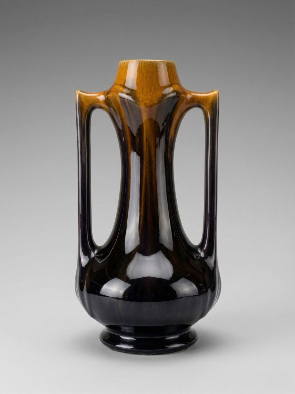 Art Deco vase in flamed black-brown enameled stoneware – openwork handles – French work – 1930s – 28 cm