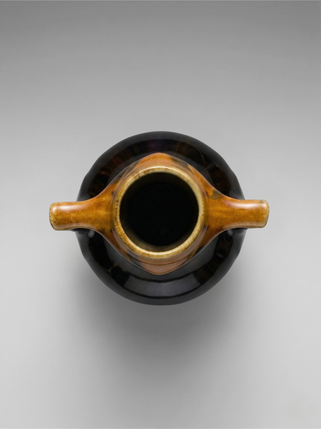 Art Deco vase in flamed black-brown enameled stoneware – openwork handles – French work – 1930s – 28 cm
