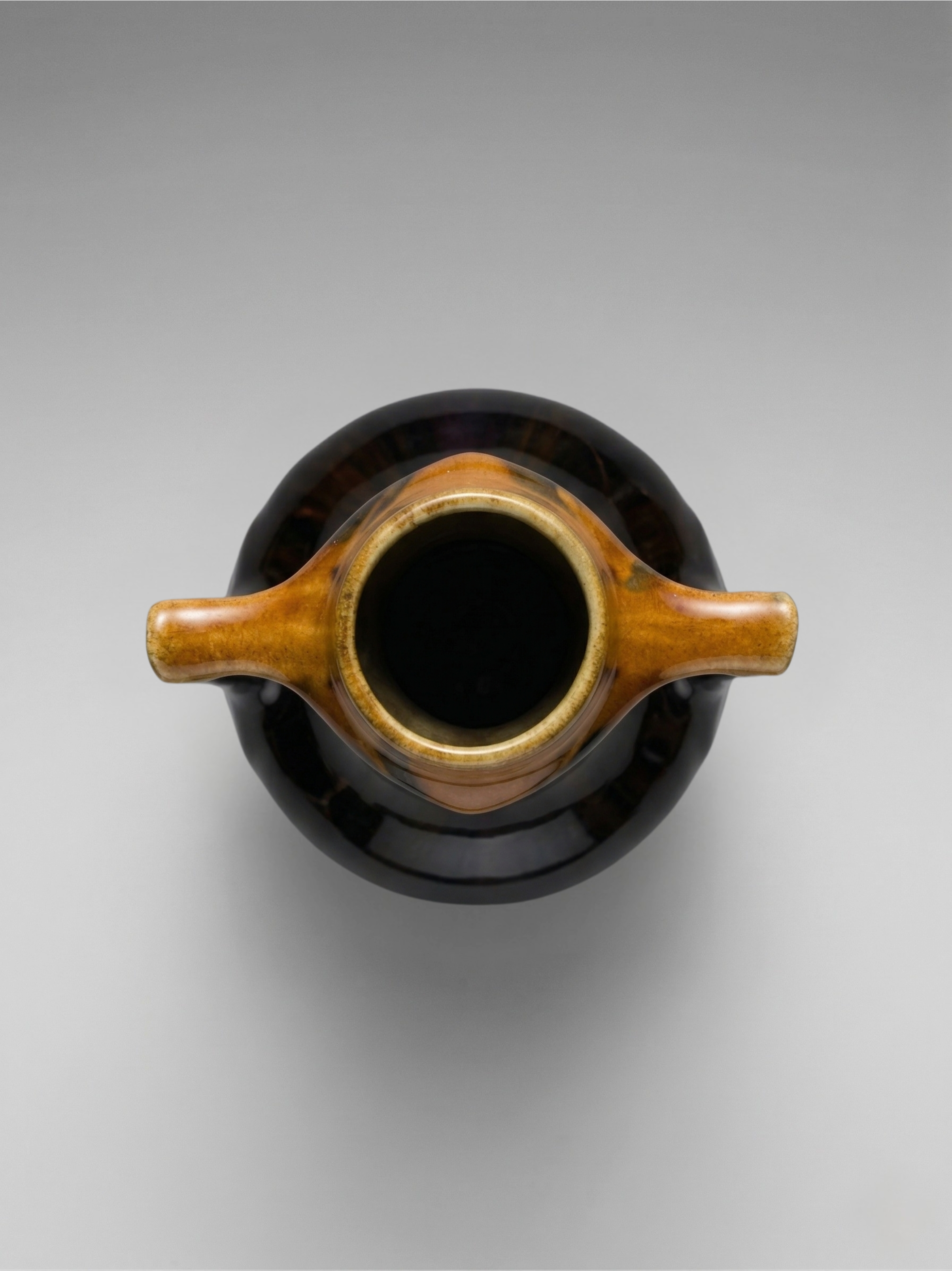 Art Deco vase in flamed black-brown enameled stoneware – openwork handles – French work – 1930s – 28 cm