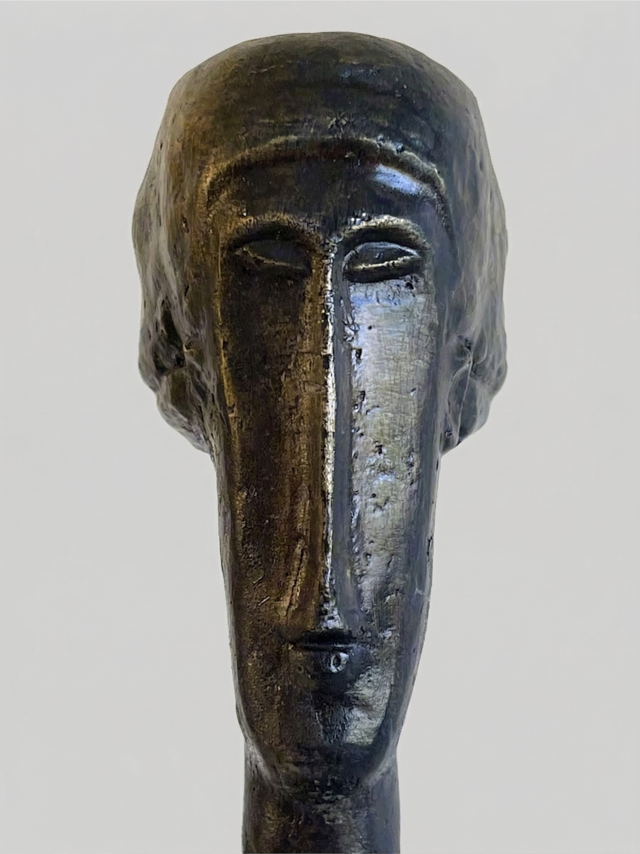 Modernist patinated bronze sculpture – stylized Modigliani-inspired head on black marble base – 25 cm