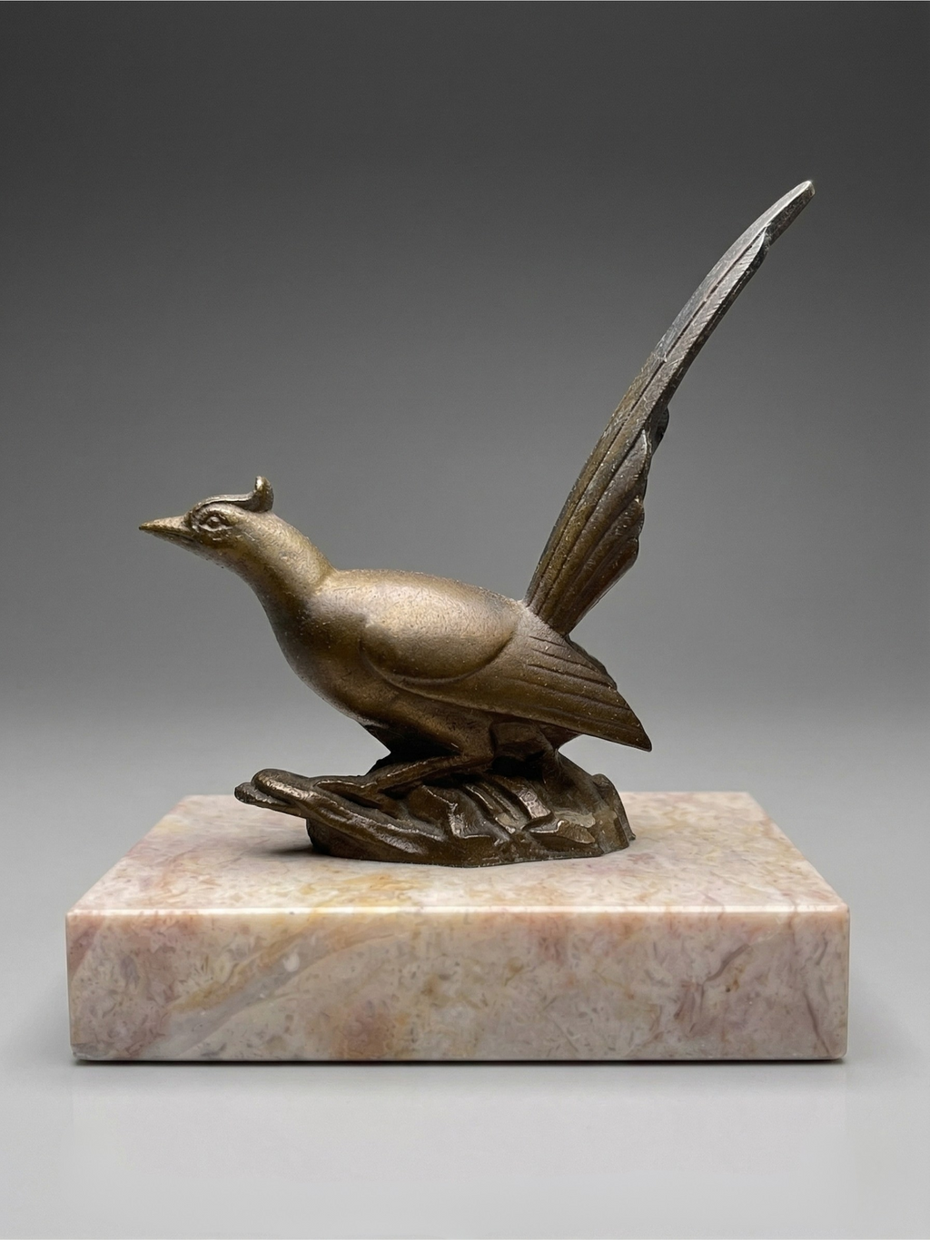 Pair of Art Deco bird bookends – patinated spelter and pink marble – vintage – 1930s