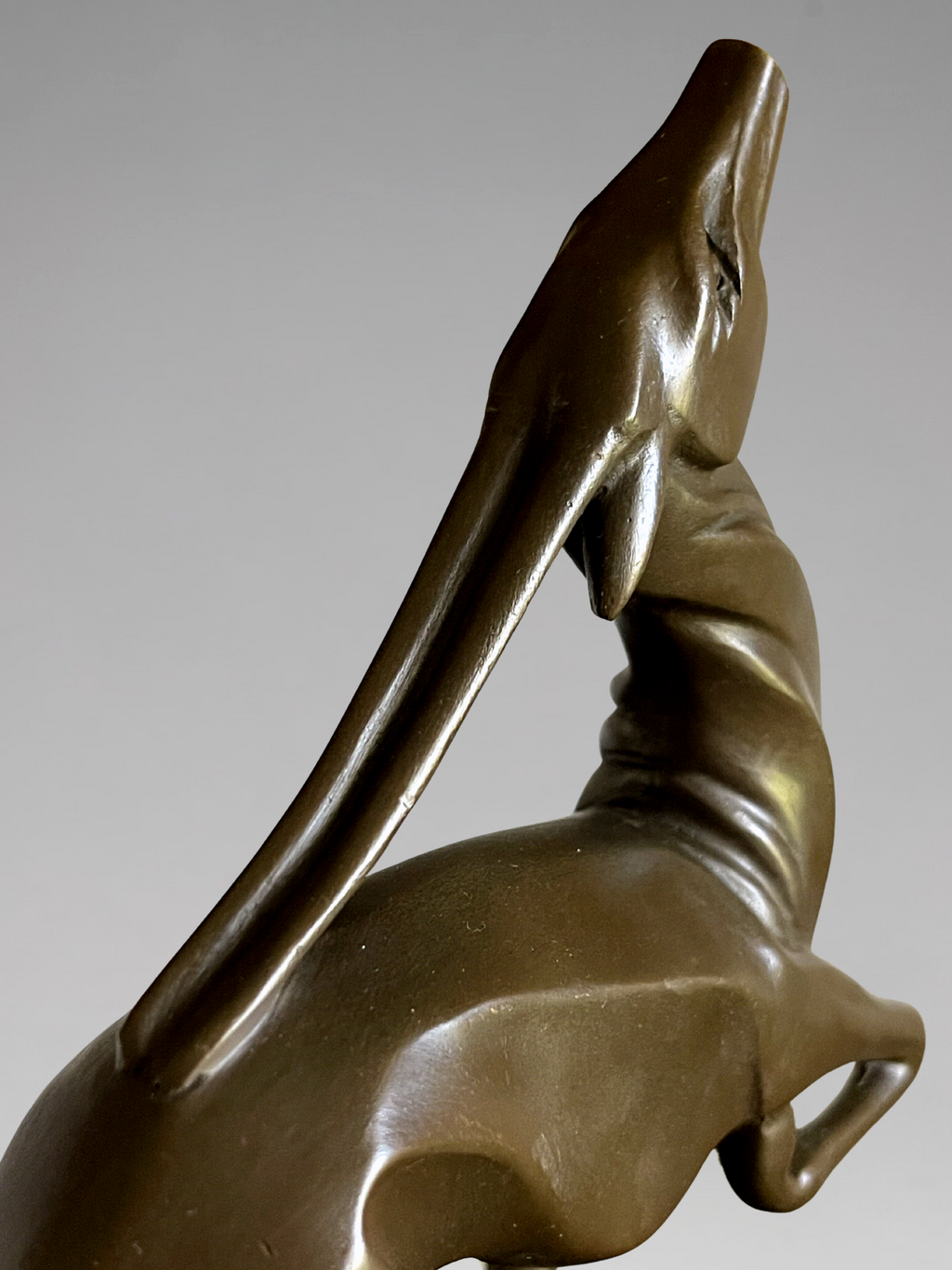 Art Deco patinated bronze antelope sculpture, after Marcel Bouraine, black marble base – 22 cm