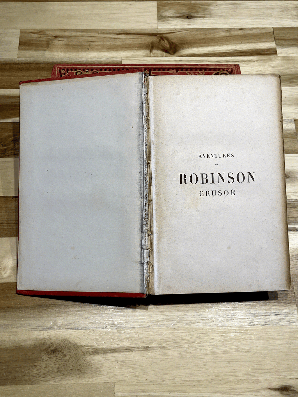 Livre ancien “Aventures de Robinson Crusoé” – Daniel De Foë – Émile Guérin Éditeur – Fin XIXe siècle – Reliure rouge illustrée
