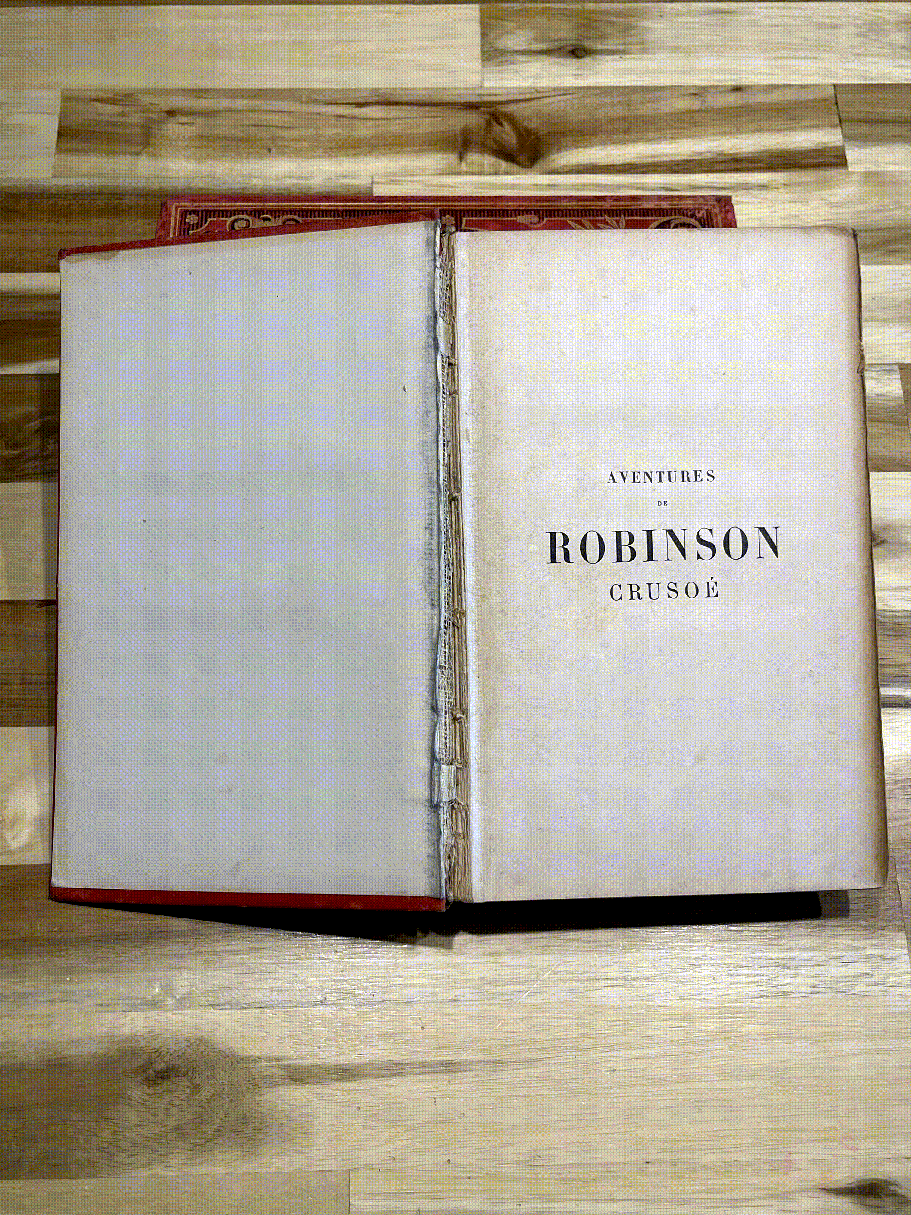 Livre ancien “Aventures de Robinson Crusoé” – Daniel De Foë – Émile Guérin Éditeur – Fin XIXe siècle – Reliure rouge illustrée